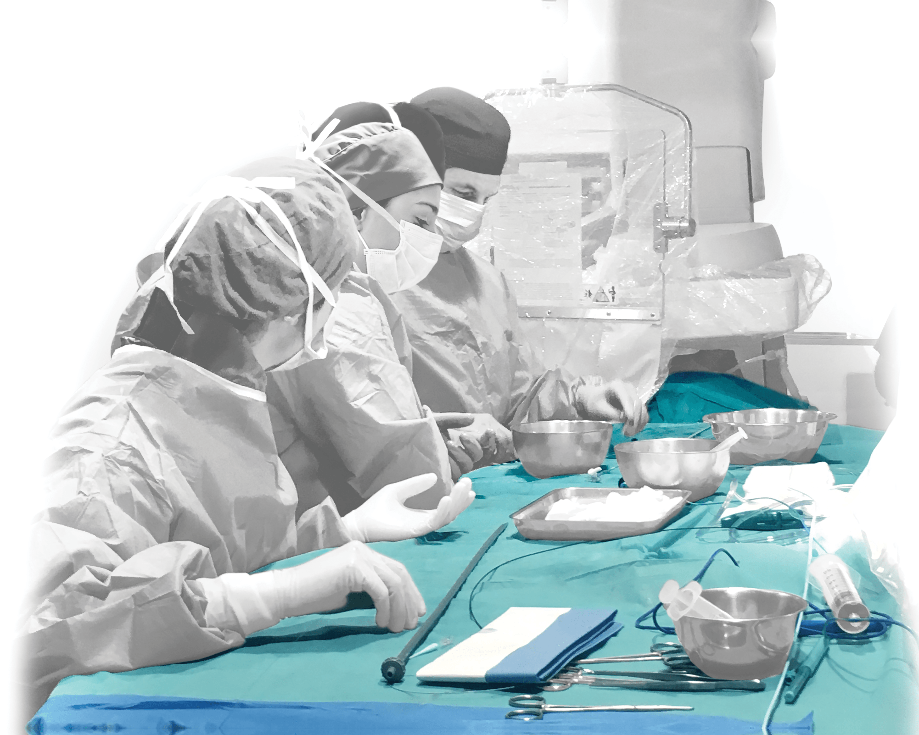 A smiling bald man in a suit stands in front of a modern building with an "ADEPT" sign.